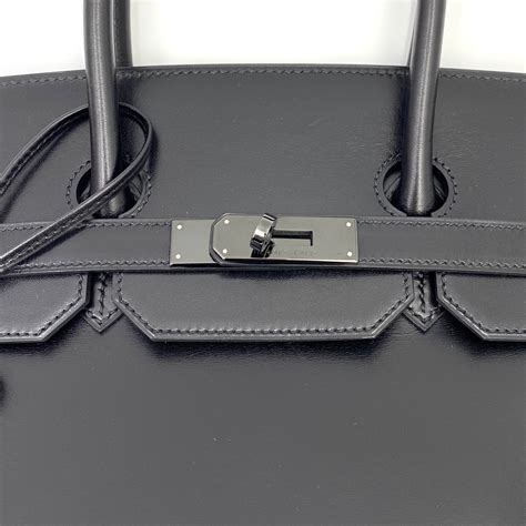 hermes so black leather strap.